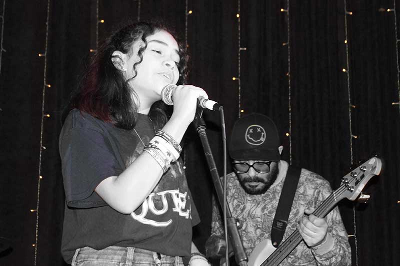 Singing lessons program's Student on stage